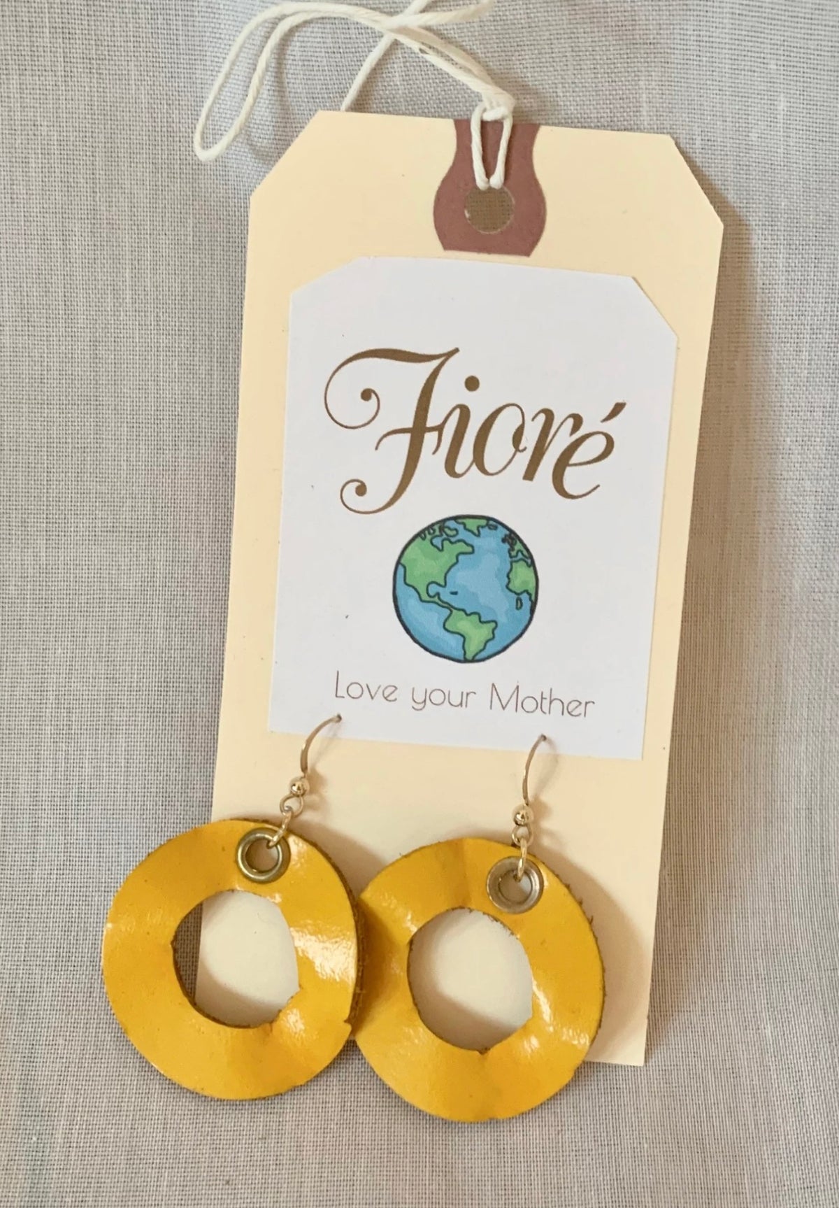 Handmade reclaimed leather circle hoop earrings.