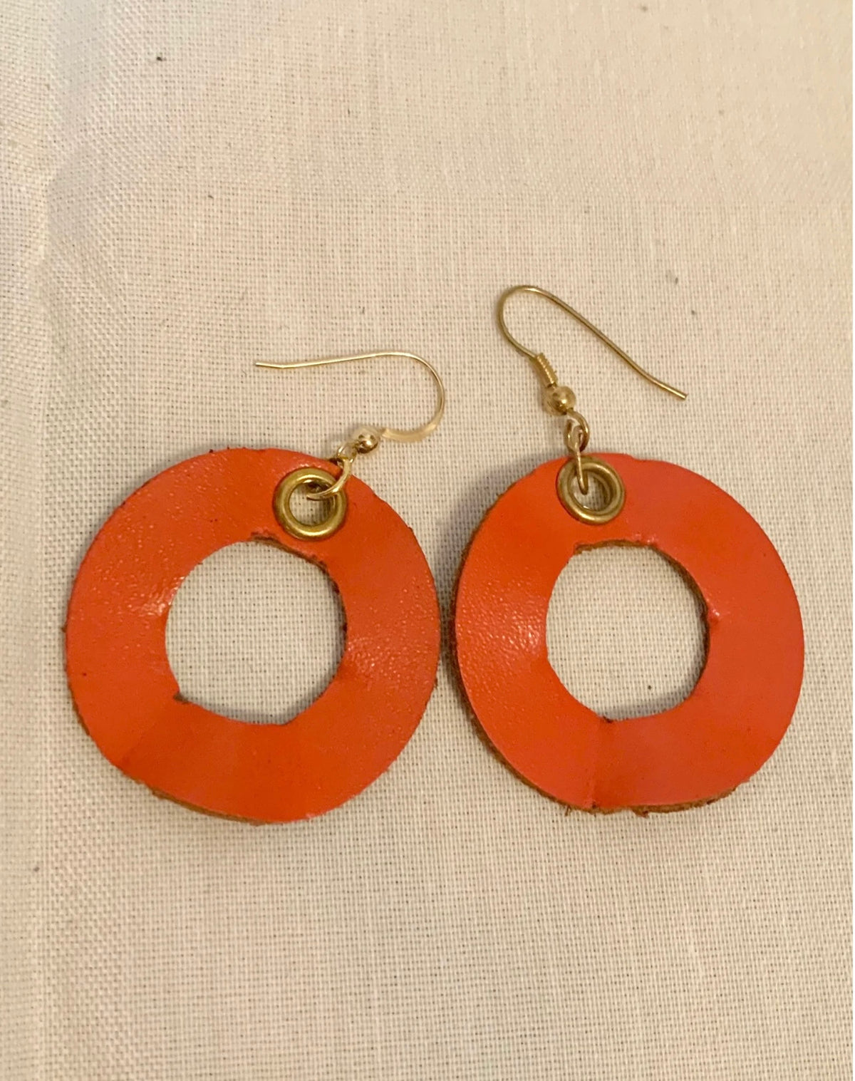 Handmade reclaimed leather circle hoop earrings.