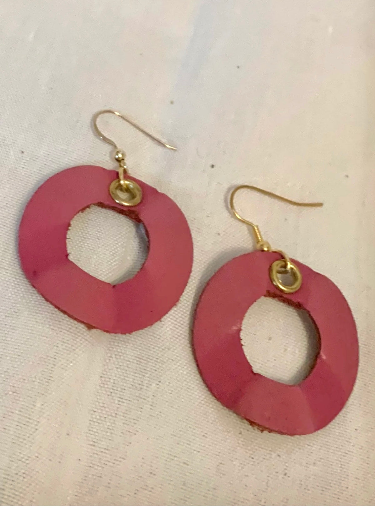 Handmade reclaimed leather circle hoop earrings.